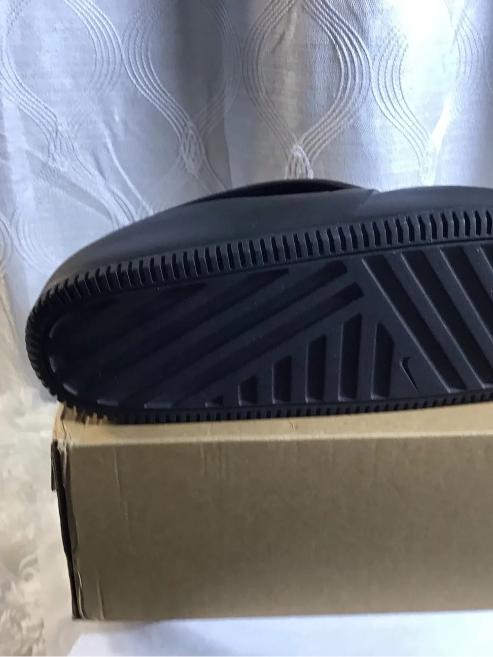 Nike Black Men’s Slip-On Foam Flip Flops